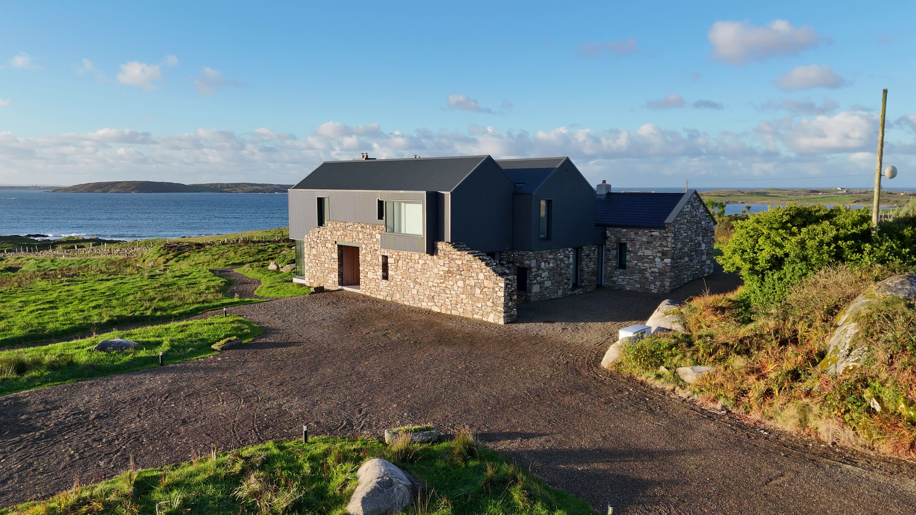 Back elevation of the cottage, showing the views the home has over the sea.