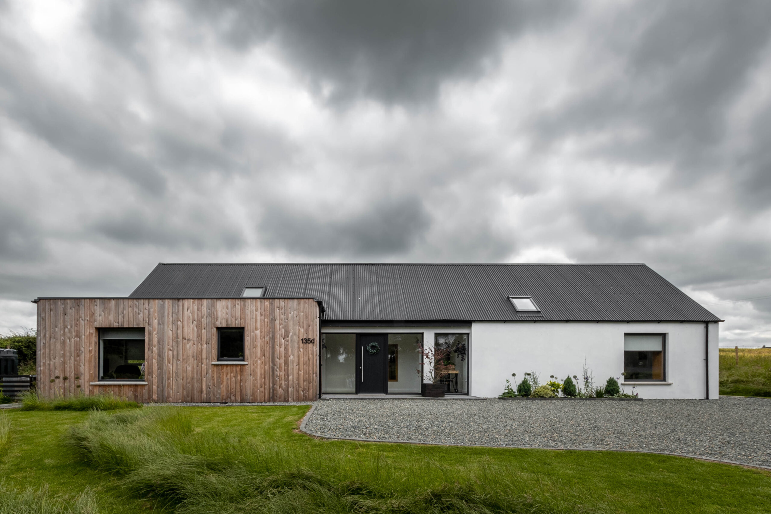 Full front elevation showing the whole bungalow