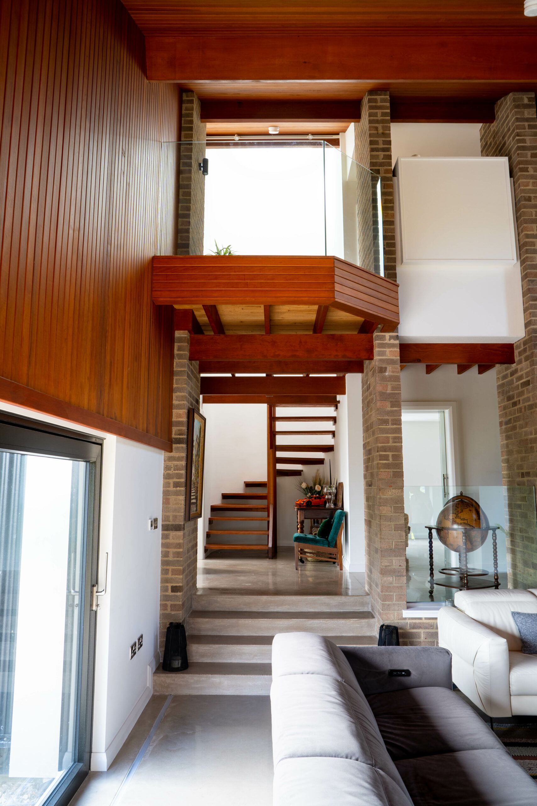 View of the open staircase leading from the living room to the bedrooms