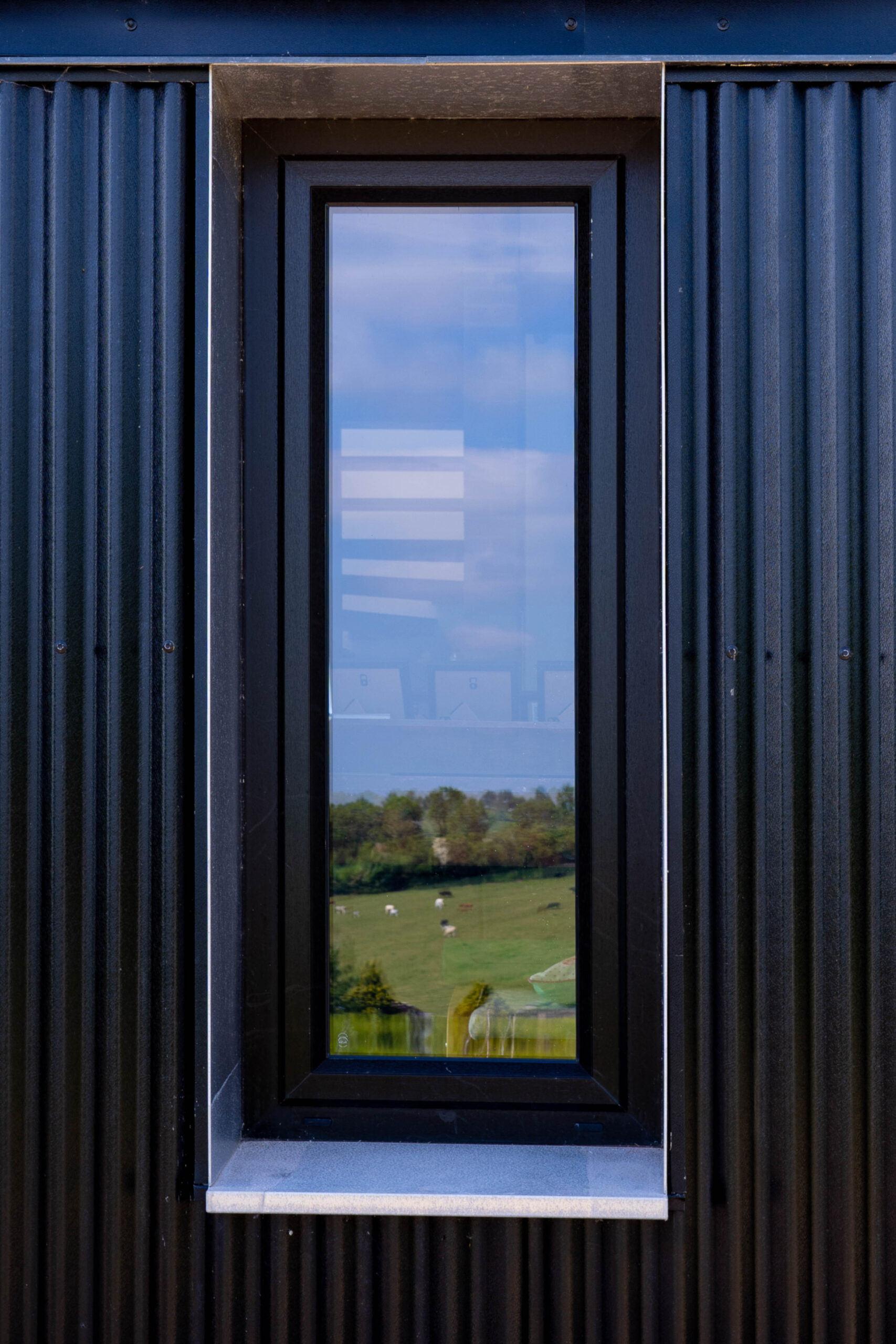 Narrow, long windows to modernise the look of the home.